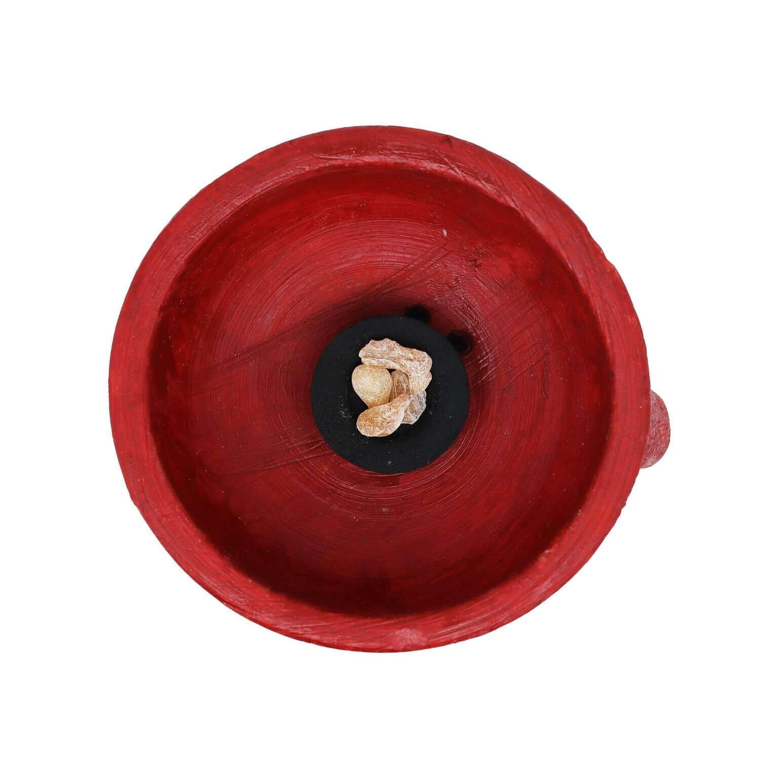 Ciotola rossa con incenso in grani