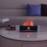 Diffusore LED con effetto fuoco su tavolino da salotto.